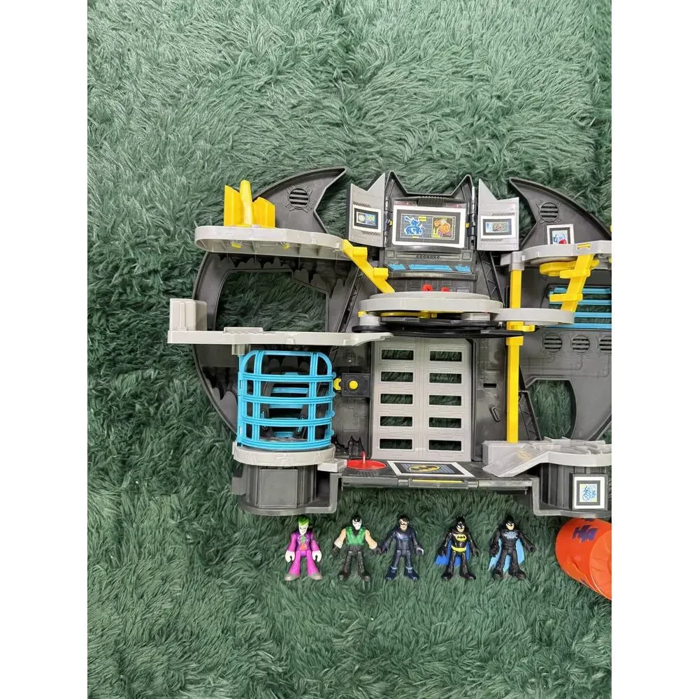 Fisher-Price Imaginext DC Super Friends Batcave Playset with 5 Figures & Vehicle